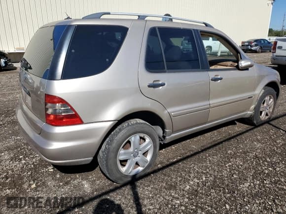✅ 2005 Mercedes-Benz M 500 • VIN: 4JGAB75E85A529110 • Lot: 80557034. Listed on Copart with 130,560 mi. Free auction sales archive from the USA and detailed vehicle history report at DreamBid. Image 3.