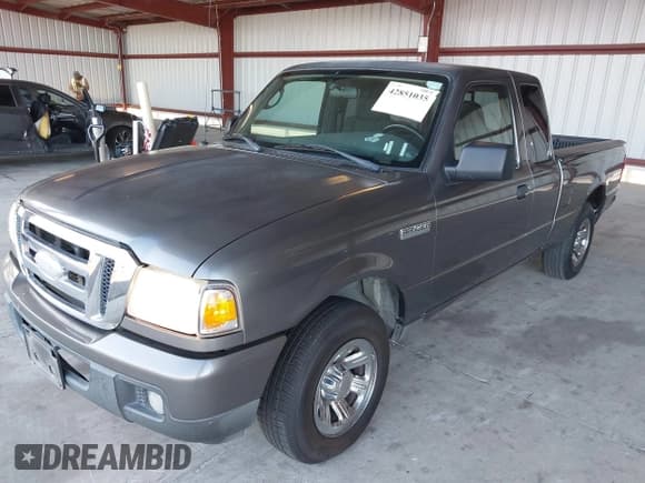 ✅ 2007 Ford Ranger STX • VIN: 1FTYR44U27PA96230 • Лот: 42851035. Опубликован ранее на IAAI с пробегом 162 387 миль. Бесплатный доступ к архиву аукционных продаж из США и подробный отчёт об истории автомобиля на DreamBid. Изображение 2.