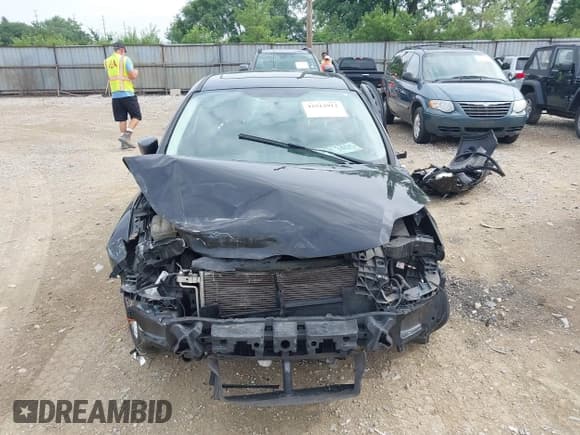 ✅ 2014 Ford Focus Titanium • VIN: 1FADP3N25EL194433 • Lot: 42512912. Listed on IAAI with 105,355 mi. Free auction sales archive from the USA and detailed vehicle history report at DreamBid. Image 12.