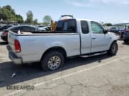 ✅ 2001 Ford F-150 XL • VIN: 1FTRX17L71KA17165 • Lot: 57982675. Listed on Copart with Not provided. Free auction sales archive from the USA and detailed vehicle history report at DreamBid. Image 3.