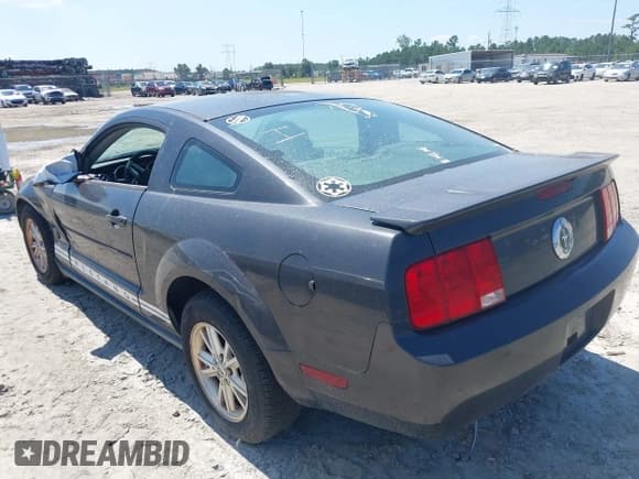✅ 2007 Ford Mustang Deluxe • VIN: 1ZVFT80NX75211227 • Лот: 43160650. Опубликован ранее на IAAI с пробегом 166 297 миль. Бесплатный доступ к архиву аукционных продаж из США и подробный отчёт об истории автомобиля на DreamBid. Изображение 3.