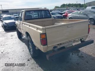 ✅ 1984 Datsun 720 • VIN: JN6ND06Y4EW011429 • Lot: 42358221. Wystawiony na IAAI z przebiegiem 148 916 mil. Bezpłatny archiwum sprzedaży aukcyjnych z USA i szczegółowy raport historii pojazdu na DreamBid. Zdjęcie 3.