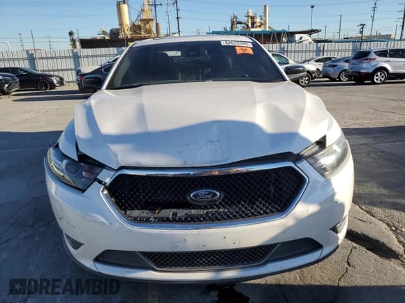 ✅ 2013 Ford Taurus SHO • VIN: 1FAHP2KT4DG140508 • Lot: 82628395. Listed on Copart with 148,897 mi. Free auction sales archive from the USA and detailed vehicle history report at DreamBid. Image 5.