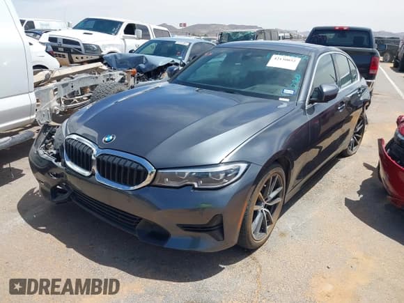 ✅ 2020 BMW 3 Series 330i • VIN: 3MW5R1J07L8B25648 • Lot: 42130052. Listed on IAAI with 64,662 mi. Free auction sales archive from the USA and detailed vehicle history report at DreamBid. Image 2.