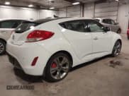 ✅ 2013 Hyundai Veloster w/Black Int • VIN: KMHTC6AD1DU109361 • Lot: 41101157. Wystawiony na IAAI z przebiegiem 119 386 mil. Bezpłatny archiwum sprzedaży aukcyjnych z USA i szczegółowy raport historii pojazdu na DreamBid. Zdjęcie 4.