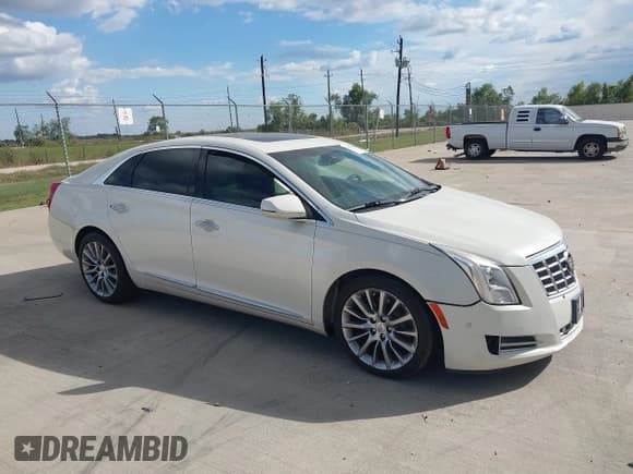 ✅ 2014 Cadillac XTS Premium • VIN: 2G61P5S35E9197414 • Лот: 43481563. Опубликован ранее на IAAI с пробегом 147 604 миль. Бесплатный доступ к архиву аукционных продаж из США и подробный отчёт об истории автомобиля на DreamBid. Изображение 13.