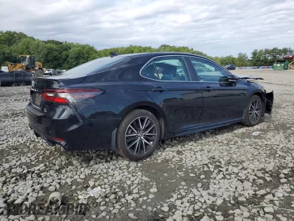 2023 Toyota Camry SE with VIN 4T1T11BK6PU090896, listed as a Copart auction lot 69367825 with 29,570 mi miles and Salvage title. Bid and sale history available at DreamBid. Image 3.