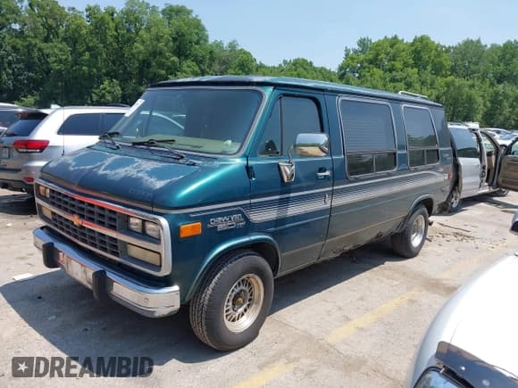 ✅ 1995 Chevrolet Chevy Van • VIN: 1GBEG25K5SF120517 • Lot: 42469924. Wystawiony na IAAI z przebiegiem 99 761 mil. Bezpłatny archiwum sprzedaży aukcyjnych z USA i szczegółowy raport historii pojazdu na DreamBid. Zdjęcie 2.