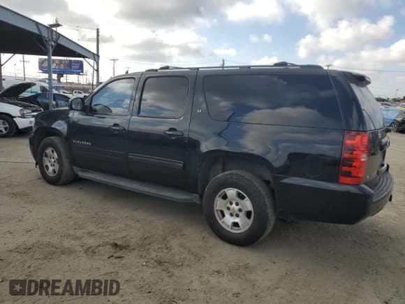 ✅ 2014 Chevrolet Suburban LT • VIN: 1GNSCJE00ER185661 • Лот: 82712675. Опубликован ранее на Copart с пробегом 101 363 миль. Бесплатный доступ к архиву аукционных продаж из США и подробный отчёт об истории автомобиля на DreamBid. Изображение 2.