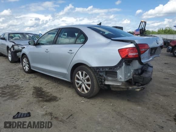 ✅ 2015 Volkswagen Jetta SE • VIN: 3VWD17AJ5FM412545 • Lot: 60594375. Listed on Copart with 180,324 mi. Free auction sales archive from the USA and detailed vehicle history report at DreamBid. Image 2.