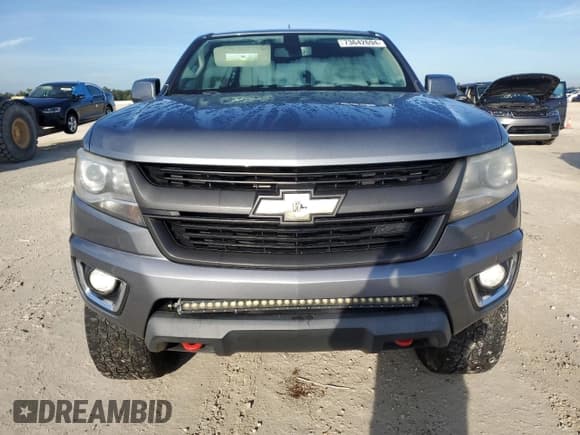 ✅ 2018 Chevrolet Colorado 4WD Z71 • VIN: 1GCGTDEN6J1288071 • Лот: 73642694. Опубликован ранее на Copart с пробегом Не указан. Бесплатный доступ к архиву аукционных продаж из США и подробный отчёт об истории автомобиля на DreamBid. Изображение 5.
