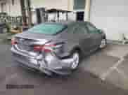 2021 Toyota Camry LE z VIN 4T1C11AK4MU590391, wystawiony jako Copart lot #81238415 z przebiegiem 63 738 mil mil oraz Szkoda całkowita • Salvage title. Historia ofert i sprzedaży dostępna na DreamBid. Obrazek 3.