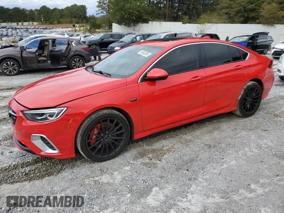 ✅ 2018 Buick Regal GS • VIN: W04GS6SS9J1163780 • Lot: 90963895. Listed on Copart with 121,319 mi. Free auction sales archive from the USA and detailed vehicle history report at DreamBid. Image 1.