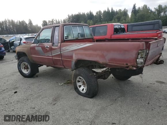 ✅ 1987 Toyota Pickup • VIN: JT4RN67DXH5058149 • Lot: 71949775. Listed on Copart with 202,880 mi. Free auction sales archive from the USA and detailed vehicle history report at DreamBid. Image 2.