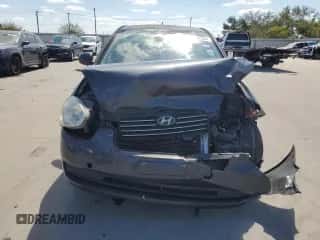 2010 Hyundai Accent GLS with VIN KMHCN4AC7AU460583, listed as a Copart auction lot 72599354 with 195,229 mi miles and Salvage title. Bid and sale history available at DreamBid. Image 5.