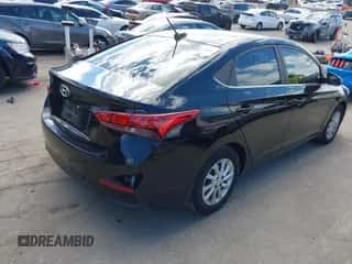 2022 Hyundai Accent SE with VIN 3KPC24A65NE166028, listed as a IAAI auction lot 43289568 with 61,170 mi miles and . Bid and sale history available at DreamBid. Image 4.