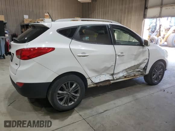 2014 Hyundai Tucson Limited with VIN KM8JUCAG2EU806309, listed as a Copart auction lot 66015735 with 104,328 mi miles and Salvage title. Bid and sale history available at DreamBid. Image 3.