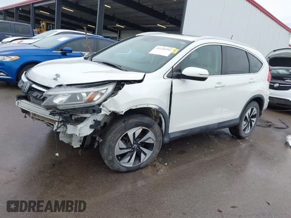 ✅ 2016 Honda CR-V Touring • VIN: 5J6RM4H98GL135574 • Lot: 43240392. Listed on IAAI with 128,876 mi. Free auction sales archive from the USA and detailed vehicle history report at DreamBid. Image 2.