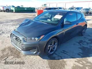 2020 Hyundai Veloster 2.0 z VIN KMHTG6AF5LU027945, wystawiony jako IAAI lot #41004918 z przebiegiem 119 015 mil mil oraz . Historia ofert i sprzedaży dostępna na DreamBid. Obrazek 2.