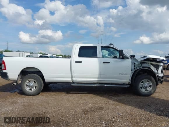 ✅ 2022 Ram 2500 Tradesman • VIN: 3C6UR5HL3NG232329 • Lot: 43401918. Listed on IAAI with 62,187 mi. Free auction sales archive from the USA and detailed vehicle history report at DreamBid. Image 14.