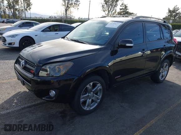 ✅ 2009 Toyota RAV4 Sport • VIN: JTMBK32V095079182 • Lot: 41399657. Listed on IAAI with 209,224 mi. Free auction sales archive from the USA and detailed vehicle history report at DreamBid. Image 2.