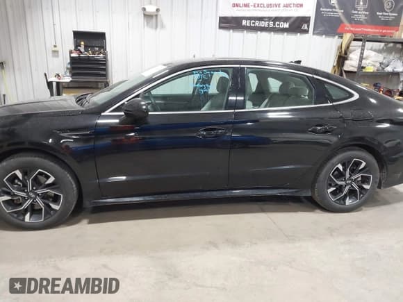 ✅ 2025 Hyundai Sonata SEL • VIN: KMHL64JA1SA470864 • Лот: 43653458. Опубликован ранее на IAAI с пробегом 15 556 миль. Бесплатный доступ к архиву аукционных продаж из США и подробный отчёт об истории автомобиля на DreamBid. Изображение 15.