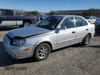 2003 Hyundai Accent GL with VIN KMHCG45C63U413388, listed as a Copart auction lot 88979235 with 240,928 mi miles and Salvage title. Bid and sale history available at DreamBid. Image 1.