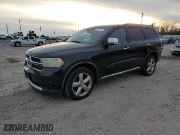 ✅ 2012 Dodge Durango Citadel • VIN: 1C4RDHEG4CC257195 • Lot: 84212444. Listed on Copart with 302,456 mi. Free auction sales archive from the USA and detailed vehicle history report at DreamBid. Image 1.