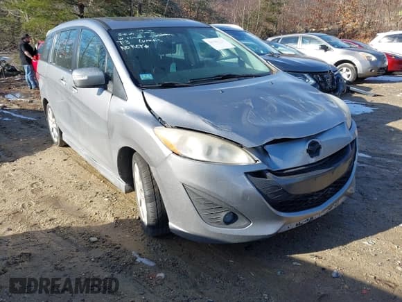 ✅ 2013 Mazda 5 Grand Touring • VIN: JM1CW2DL5D0158464 • Лот: 43605979. Опубликован ранее на IAAI с пробегом Не указан. Бесплатный доступ к архиву аукционных продаж из США и подробный отчёт об истории автомобиля на DreamBid. Изображение 1.
