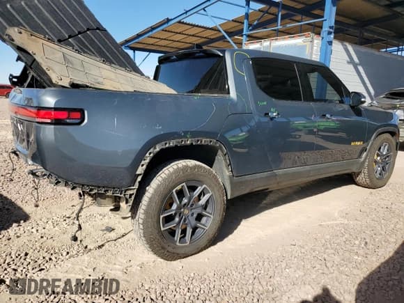 ✅ 2022 Rivian R1T Launch Edition • VIN: 7FCTGAAL0NN003525 • Lot: 79303134. Listed on Copart with 45,598 mi. Free auction sales archive from the USA and detailed vehicle history report at DreamBid. Image 3.