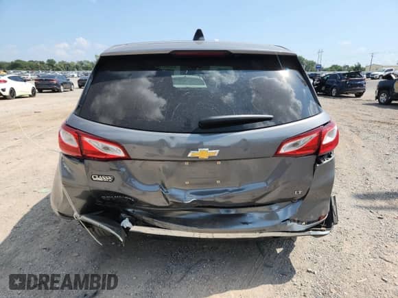 2018 Chevrolet Equinox LT с VIN 3GNAXJEV7JL119542, выставлен на аукционе Copart как лот 81046415 с пробегом 64 880 миль миль и Списание • Salvage title. История ставок и продаж доступна на DreamBid. Изображение 6.