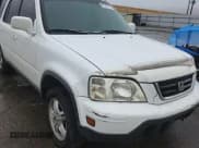 ✅ 2000 Honda CR-V SE • VIN: JHLRD1870YS009089 • Lot: 81332725. Listed on Copart with 190,259 mi. Free auction sales archive from the USA and detailed vehicle history report at DreamBid. Image 14.