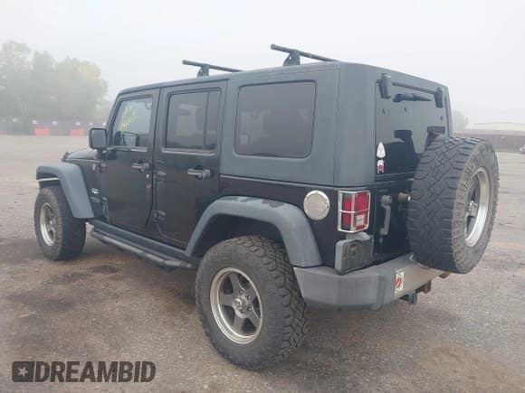 ✅ 2008 Jeep Wrangler Unlimited Sahara • VIN: 1J4GA59158L636793 • Lot: 43466197. Listed on IAAI with 239,794 mi. Free auction sales archive from the USA and detailed vehicle history report at DreamBid. Image 3.