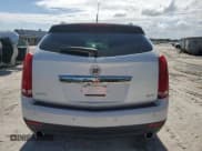 ✅ 2014 Cadillac SRX Performance Collection • VIN: 3GYFNCE30ES643443 • Lot: 78481064. Listed on Copart with 106,657 mi. Free auction sales archive from the USA and detailed vehicle history report at DreamBid. Image 6.