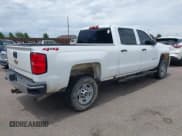 ✅ 2018 Chevrolet Silverado 2500HD Work Truck • VIN: 1GC1KUEG4JF271444 • Lot: 42588159. Listed on IAAI with 210,808 mi. Free auction sales archive from the USA and detailed vehicle history report at DreamBid. Image 4.