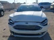 ✅ 2017 Ford Fusion Hybrid Titanium • VIN: 3FA6P0RU1HR138028 • Lot: 43725051. Listed on IAAI with 85,361 mi. Free auction sales archive from the USA and detailed vehicle history report at DreamBid. Image 12.