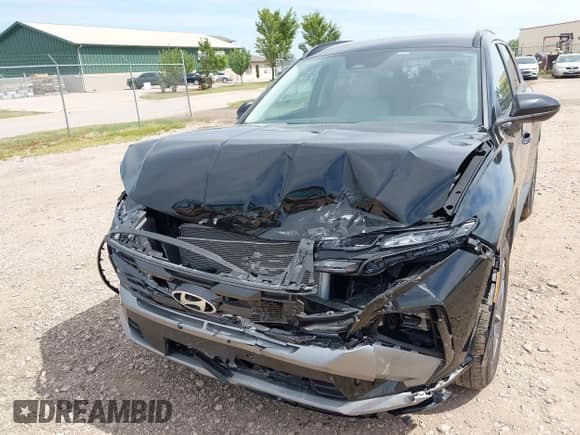 2025 Hyundai Tucson SEL with VIN 5NMJBCDE9SH449458, listed as a IAAI auction lot 43075055 with 7,471 mi miles and . Bid and sale history available at DreamBid. Image 6.