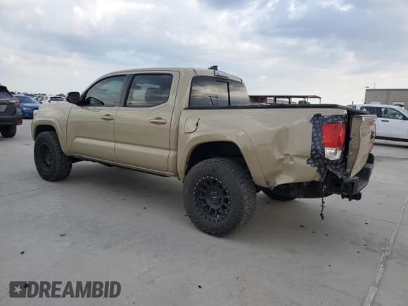 ✅ 2017 Toyota Tacoma SR5 • VIN: 3TMCZ5AN1HM096871 • Lot: 82666005. Listed on Copart with 141,322 mi. Free auction sales archive from the USA and detailed vehicle history report at DreamBid. Image 2.