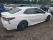 2021 Toyota Camry SE with VIN 4T1G11BK6MU025267, listed as a IAAI auction lot 42648821 with 113,931 mi miles and . Bid and sale history available at DreamBid. Image 4.