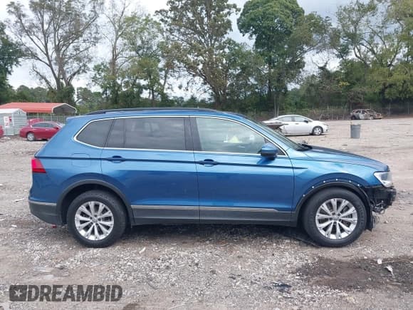 ✅ 2018 Volkswagen Tiguan SEL • VIN: 3VV3B7AX0JM187672 • Лот: 43338554. Опубликован ранее на IAAI с пробегом 184 529 миль. Бесплатный доступ к архиву аукционных продаж из США и подробный отчёт об истории автомобиля на DreamBid. Изображение 14.