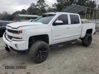 ✅ 2018 Chevrolet Silverado 1500 LT • VIN: 3GCUKREC1JG480341 • Лот: 84434194. Опубликован ранее на Copart с пробегом 95 932 миль. Бесплатный доступ к архиву аукционных продаж из США и подробный отчёт об истории автомобиля на DreamBid. Изображение 1.