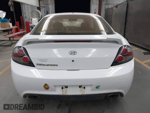 2008 Hyundai Tiburon GS с VIN KMHHM66D98U280005, выставлен на аукционе IAAI как лот 42580014 с пробегом 267 858 миль миль и . История ставок и продаж доступна на DreamBid. Изображение 16.