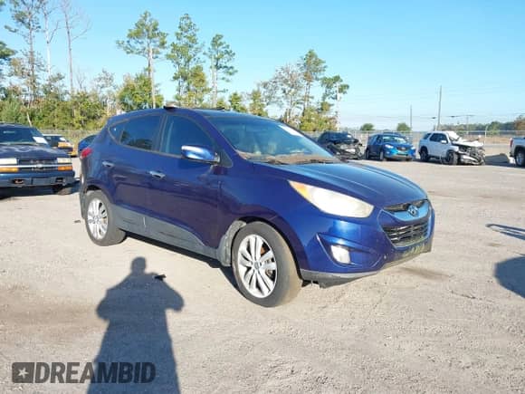 2011 Hyundai Tucson GLS with VIN KM8JU3AC5BU197581, listed as a IAAI auction lot 43611632 with 188,557 mi miles and . Bid and sale history available at DreamBid. Image 1.