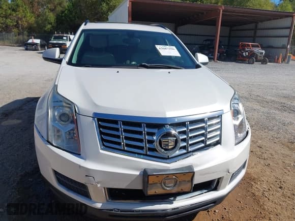 ✅ 2013 Cadillac SRX • VIN: 3GYFNAE38DS540323 • Lot: 43687296. Listed on IAAI with 143,093 mi. Free auction sales archive from the USA and detailed vehicle history report at DreamBid. Image 12.