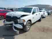 2024 Ram 1500 SLT with VIN 1C6RR6GG3RS128728, listed as a IAAI auction lot 41598041 with 24,872 mi miles and . Bid and sale history available at DreamBid. Image 2.