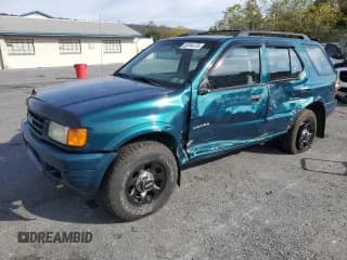 ✅ 1998 Isuzu Rodeo S • VIN: 4S2CM58W9W4300892 • Lot: 85744175. Wystawiony na Copart z przebiegiem 186 035 mil. Bezpłatny archiwum sprzedaży aukcyjnych z USA i szczegółowy raport historii pojazdu na DreamBid. Zdjęcie 1.