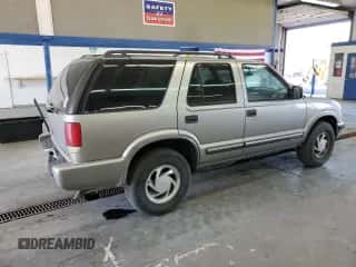 2000 Chevrolet Blazer LT z VIN 1GNDT13WXY2344263, wystawiony jako Copart lot #68523484 z przebiegiem 157 060 mil mil oraz Szkoda całkowita • Salvage title. Historia ofert i sprzedaży dostępna na DreamBid. Obrazek 3.