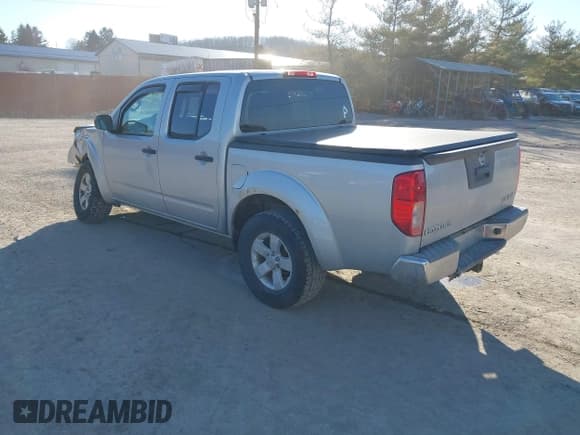 ✅ 2013 Nissan Frontier SL • VIN: 1N6AD0EV0DN731594 • Lot: 41702767. Listed on IAAI with 101,611 mi. Free auction sales archive from the USA and detailed vehicle history report at DreamBid. Image 3.