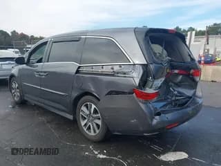 ✅ 2015 Honda Odyssey Touring Elite • VIN: 5FNRL5H9XFB041101 • Лот: 43063363. Опубликован ранее на IAAI с пробегом 162 011 миль. Бесплатный доступ к архиву аукционных продаж из США и подробный отчёт об истории автомобиля на DreamBid. Изображение 3.