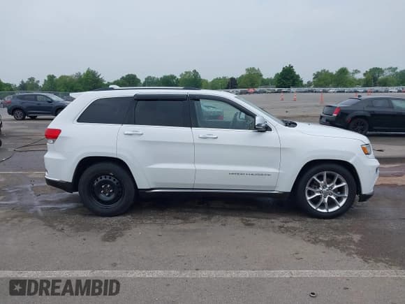 ✅ 2015 Jeep Grand Cherokee Summit • VIN: 1C4RJFJG1FC135935 • Lot: 42494004. Listed on IAAI with 201,553 mi. Free auction sales archive from the USA and detailed vehicle history report at DreamBid. Image 13.